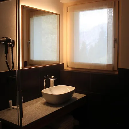 Oltre Alpine Hotell